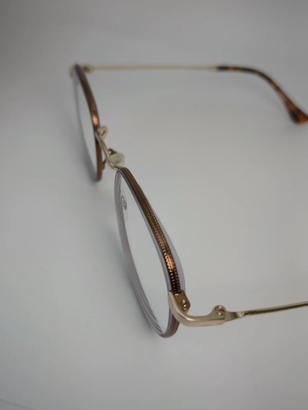 Daydream. Classic Round Metal Frame, Copper Eyewire. Gloss Gold Bridge, Temples.